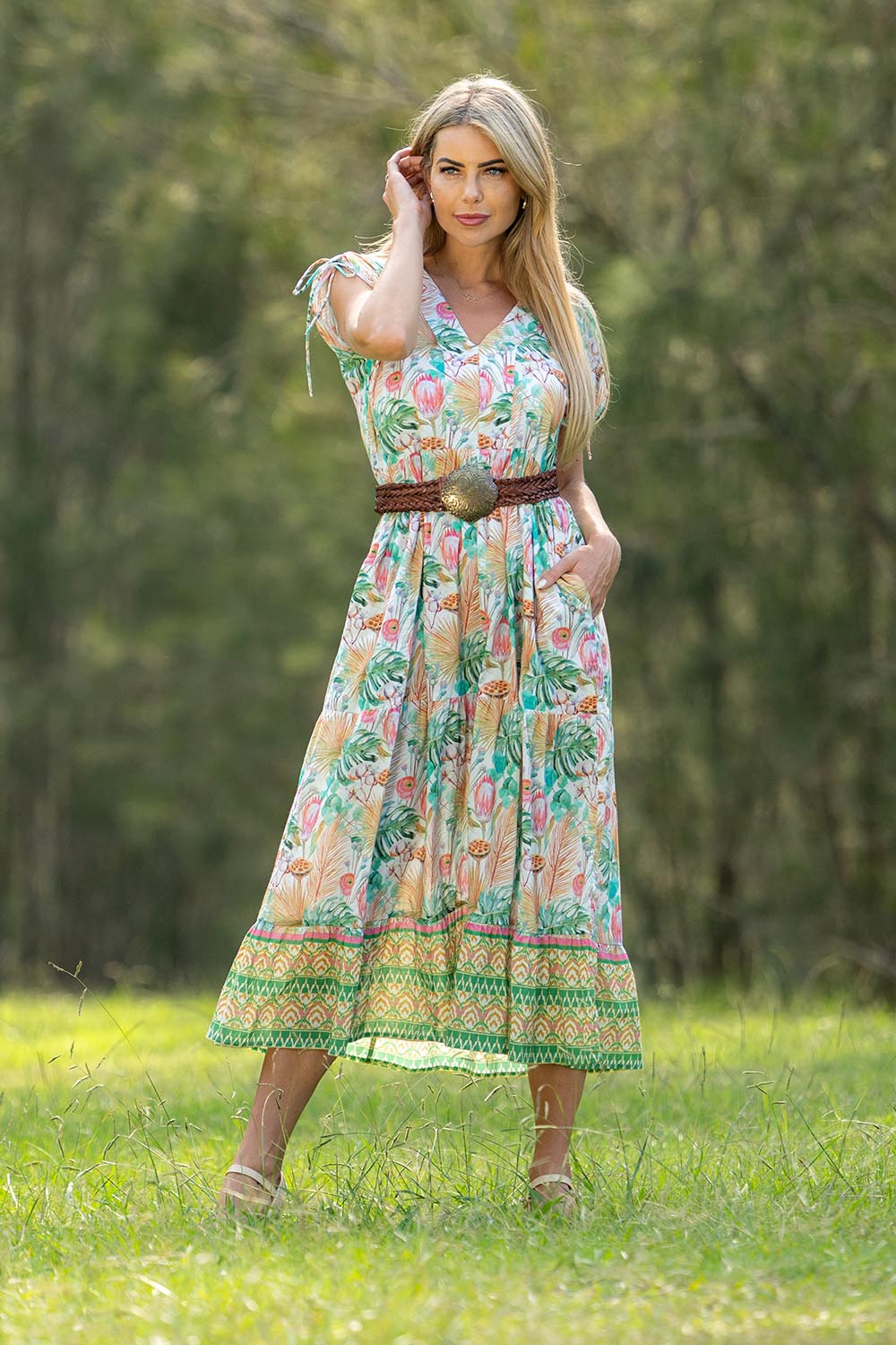 A model wearing the Mona Bluebell Cotton Dress in colour Mona, from the front, showing the whole outfit