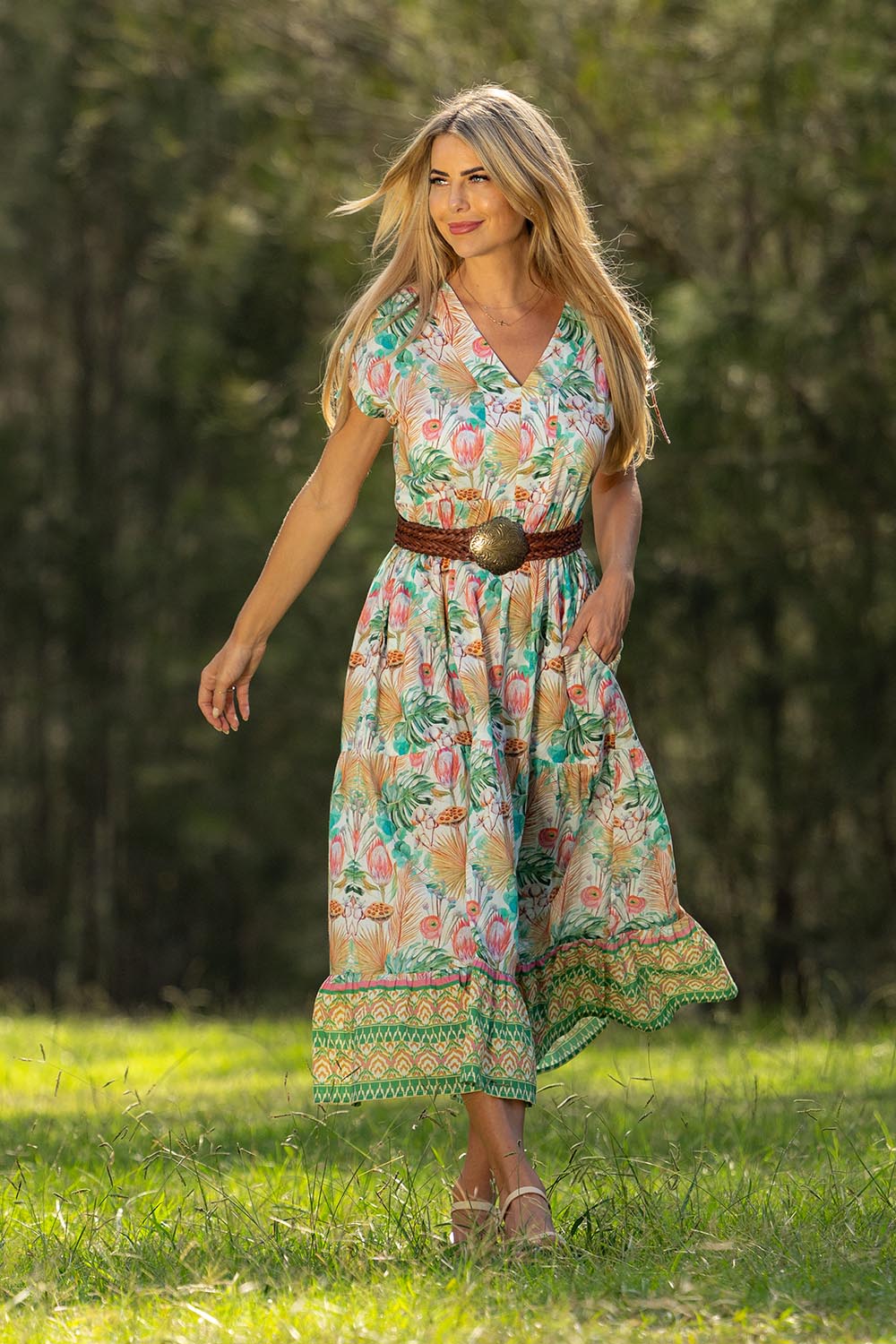 A model wearing the Mona Bluebell Cotton Dress in colour Mona, from the front, showing the whole outfit
