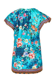 Product shot of the Lotus Garden Sarah Cotton Top in colour Lotus (Blue), from the back