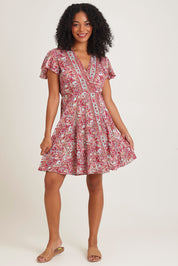 Model Ziara wearing size S of the Cleo Silk Blend Wrap Dress in colour Cleo (Pink), from the front, showing the whole outfit