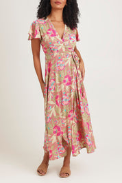 Model Ziara wearing size S of the Bloss Silk Blend Wrap Dress in colour Bloss (Pink), from the front, cropped image
