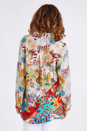 Model Emma wearing size S of the Deer Shirt in colour Multi (White), from the back