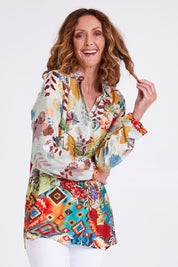 Model Emma wearing size S of the Deer Shirt in colour Multi (White), from the front, cropped image