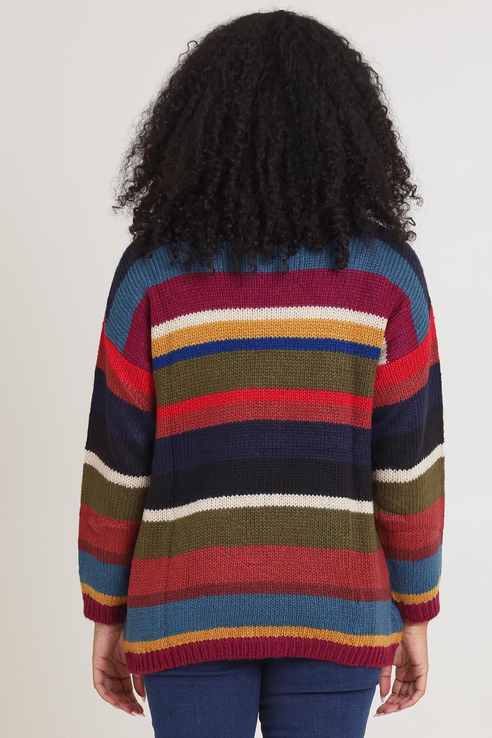 Model Ziara wearing the Stripe Sweater in colour Banff, from the back