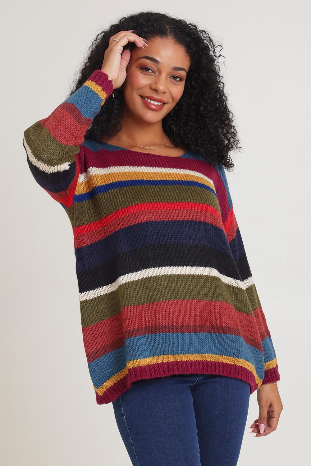 Model Ziara wearing the Stripe Sweater in colour Banff, from the front, cropped image
