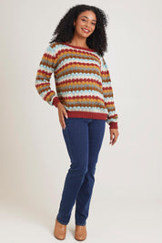 Model Ziara wearing the Aspen Sweater in colour Aspen, from the front, showing the whole outfit
