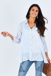 Model Gemma wearing size S of the Spot Stripe Spliced Shirt in colour Bluewhite (Blue), from the front, cropped image