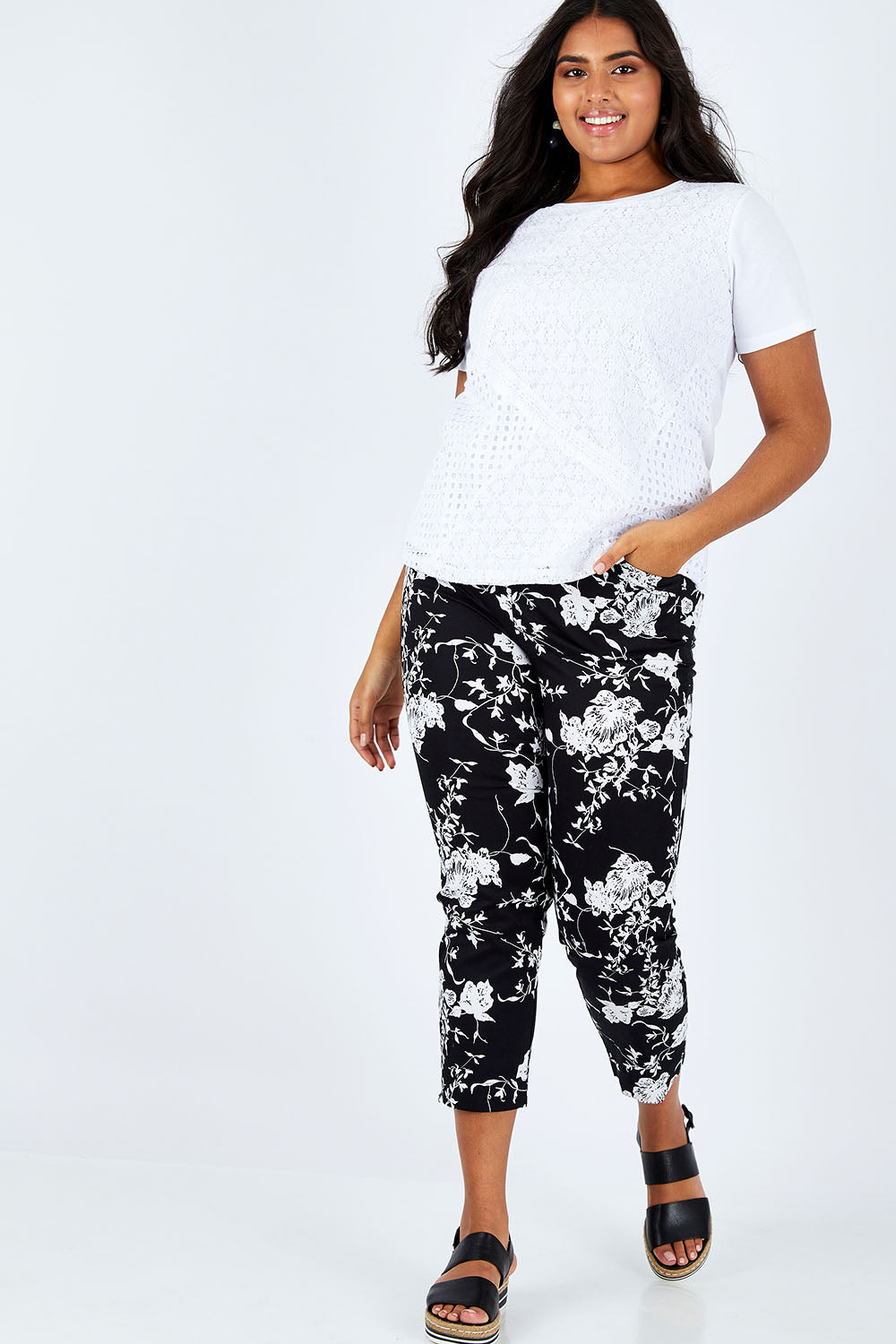 Model Shanaya wearing size L of the Print Pull On Pants in colour Black (Black), from the front, showing the whole outfit