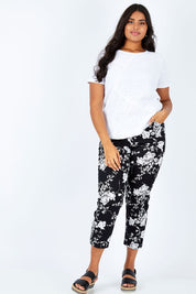 Model Shanaya wearing size L of the Print Pull On Pants in colour Black (Black), from the front, showing the whole outfit