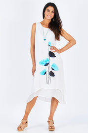 Model Gemma wearing size S of the Layered Floral Dress in colour Whiteblue (White), from the front, showing the whole outfit