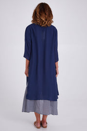Model Emma wearing size S of the Long Cardi in colour Navy (Blue), from the back