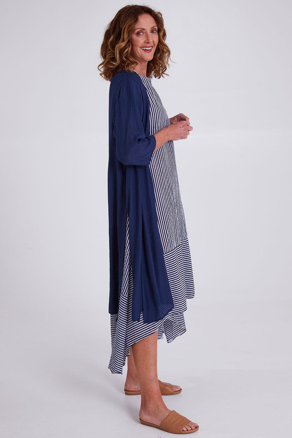 Model Emma wearing size S of the Long Cardi in colour Navy (Blue), from the front, showing the whole outfit