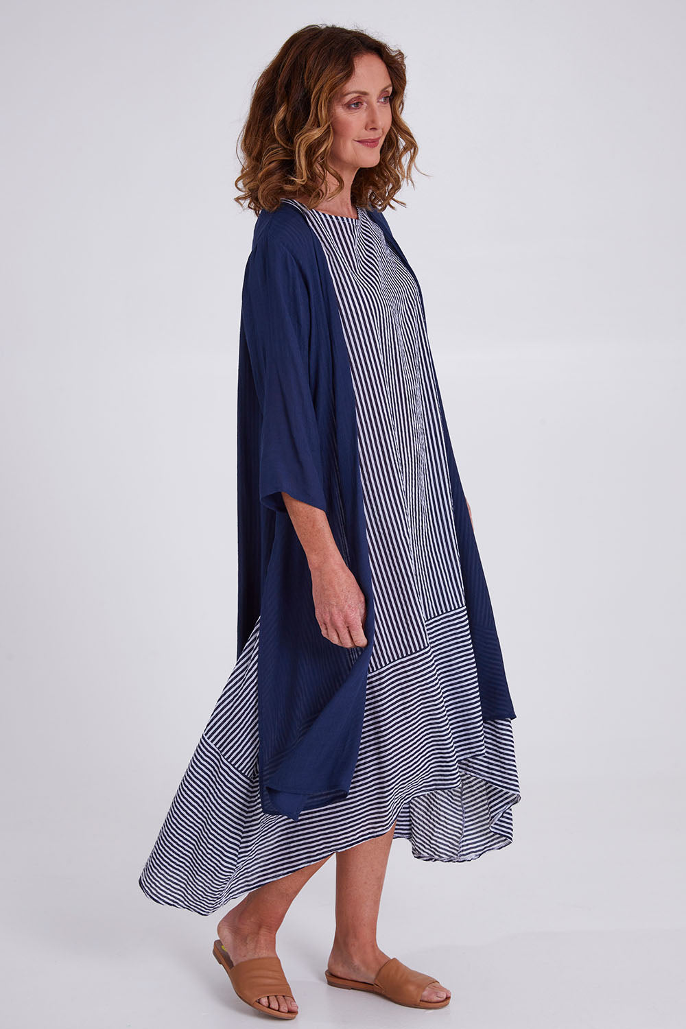 Model Emma wearing size S of the Long Cardi in colour Navy (Blue), from the front, showing the whole outfit