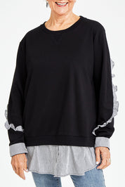 Model Elise wearing size S of the 2 In 1 Sweat in colour Black (Black), from the front, cropped image