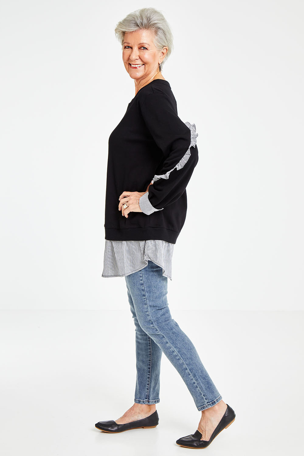 Model Elise wearing size S of the 2 In 1 Sweat in colour Black (Black), from the front, showing the whole outfit