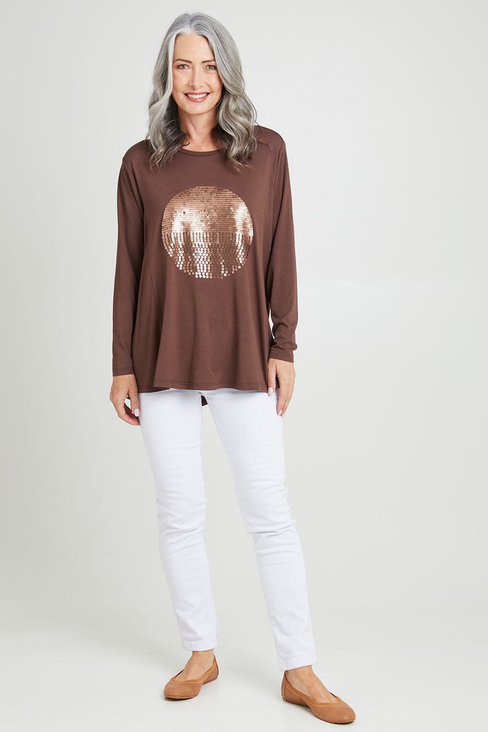 Model Luisa wearing size S of the Over The Moon Sequin Tee in colour Chocolate, from the front, showing the whole outfit
