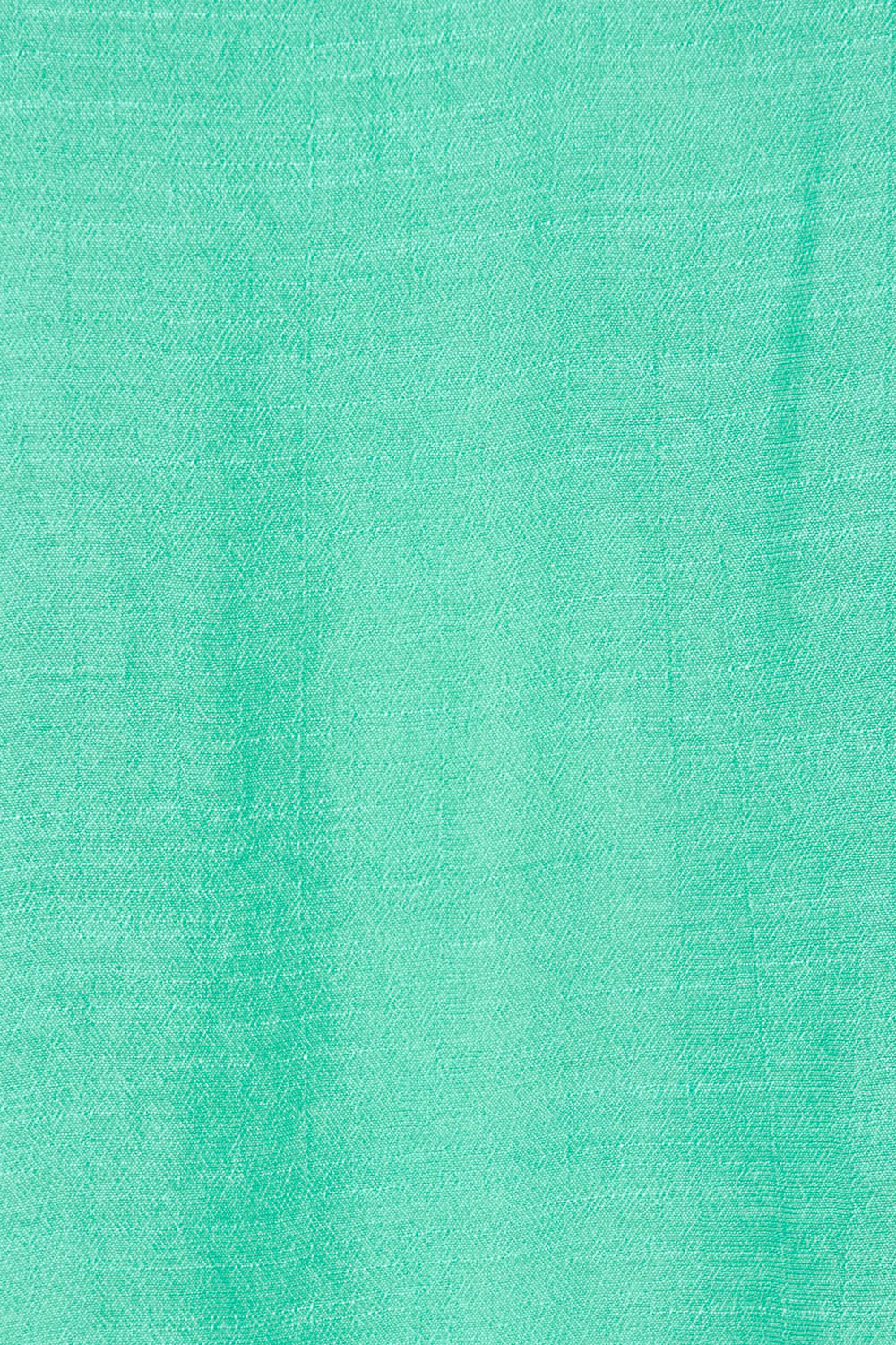 Product shot of the Button Back Top in colour Spearmint (Green), detail