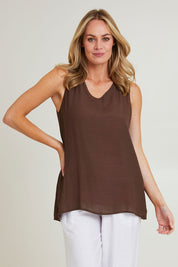 Model Grace wearing size S of the Layered Reversible Cami in colour Pinkchoc (Pink), from the front, cropped image
