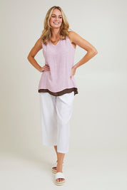 Model Grace wearing size S of the Layered Reversible Cami in colour Pinkchoc (Pink), from the front, showing the whole outfit