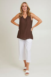 Model Grace wearing size S of the Layered Reversible Cami in colour Pinkchoc (Pink), from the front, showing the whole outfit