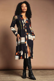 Model Ziara wearing size S of the Galleria Dress in colour Black (Black), from the front, showing the whole outfit