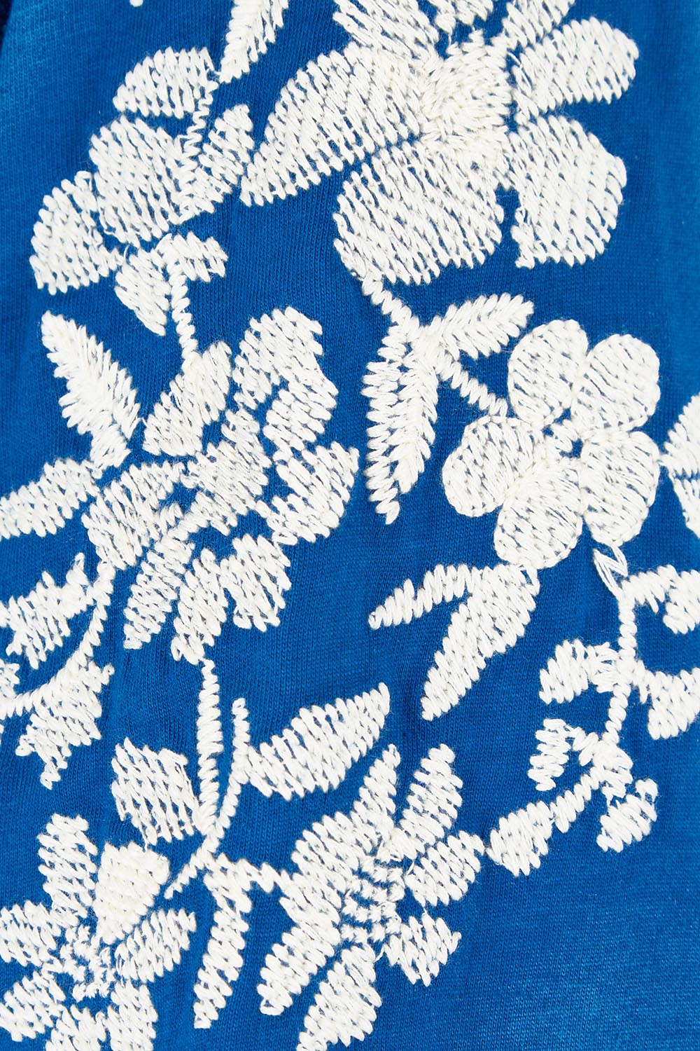Product shot of the Jill Embroidered Cotton Tee in colour Blue (Blue), detail