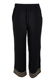 Product shot of the Cross Stitch Cotton Pant in colour Black (Black), from the back
