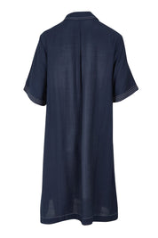 Product shot of the Top Stitch Dress in colour Navy (Blue), from the back