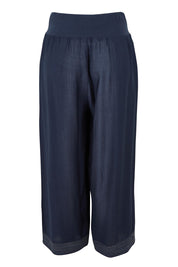 Product shot of the Top Stitch Pant in colour Navy (Blue), from the back