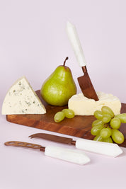 A model wearing size OneSize of the Copper Marble Cheese Knife Set Of 3 in colour Copper (Metallics), from the front, showing the whole outfit