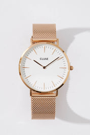A model wearing size OneSize of the La Boheme Mesh Watch in colour RoseGoldW (Metallics), from the front, showing the whole outfit
