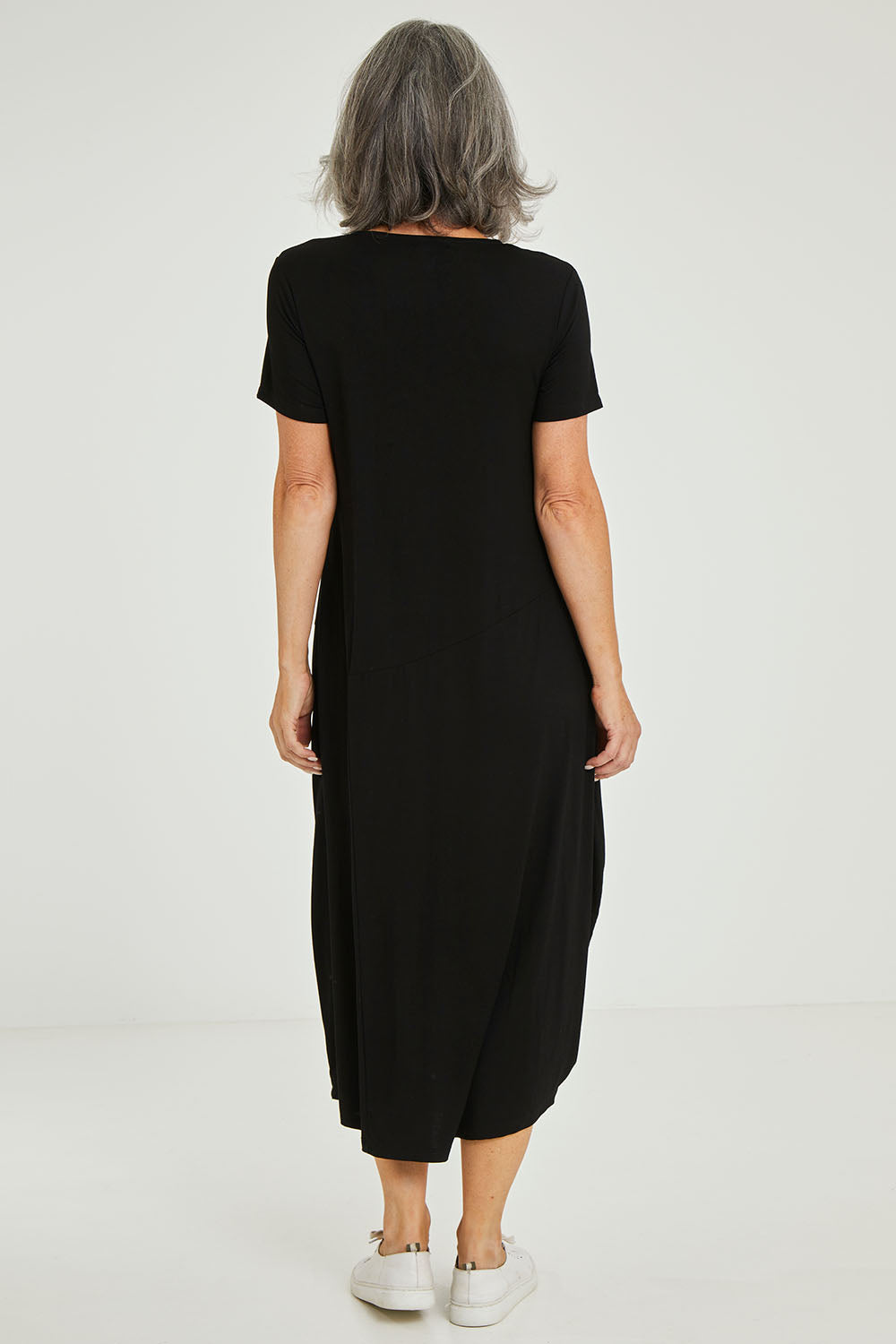 Model Luisa wearing size 10 of the Summer Cotton Blend Pocket Dress in colour Black (Black), from the back