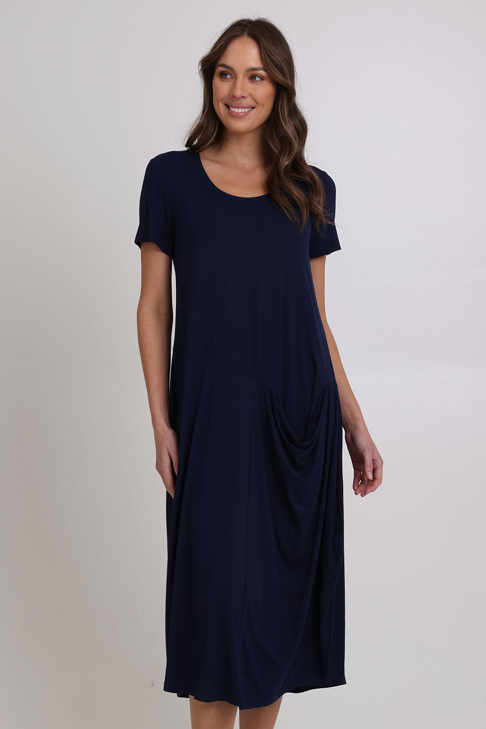 Model Madeline wearing size 10 of the Summer Cotton Blend Pocket Dress in colour Navy (Blue), from the front, cropped image