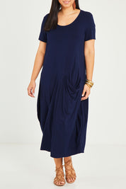 Model Noli wearing size 14 of the Summer Cotton Blend Pocket Dress in colour Navy (Blue), from the front, cropped image