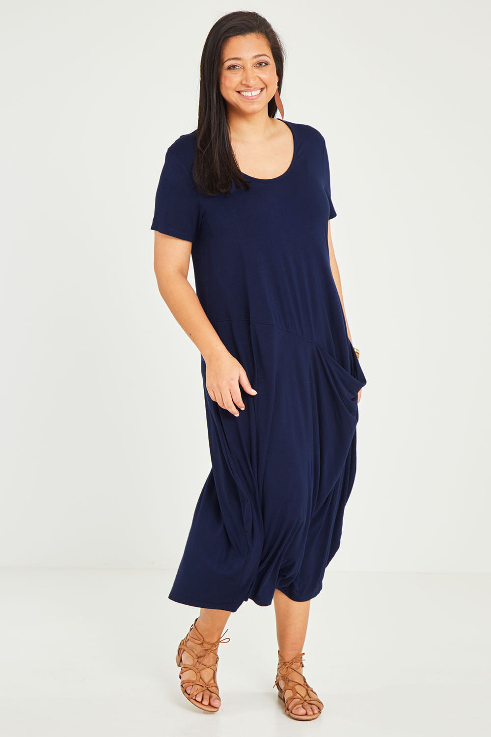 Model Noli wearing size 14 of the Summer Cotton Blend Pocket Dress in colour Navy (Blue), from the front, showing the whole outfit