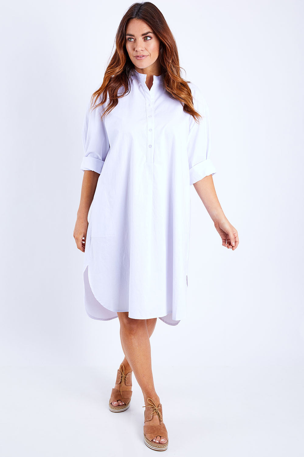 Model Laura wearing size 14 of the 3/4 Sleeve Tunic Shirt Dress in colour White (White), from the front, showing the whole outfit
