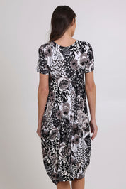 Model Madeline wearing size 10 of The Bounce Dress in colour Silverblk (Black), from the back