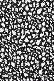 Product shot of the Cap Sleeve Bounce Dress in colour Blkwhite (Black), detail