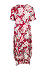 Product shot of the Cap Sleeve Bounce Dress in colour Cherry (Red), from the back