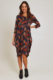 Model Madeline wearing size 10 of the Bounce Dress in colour Multi, from the front, showing the whole outfit