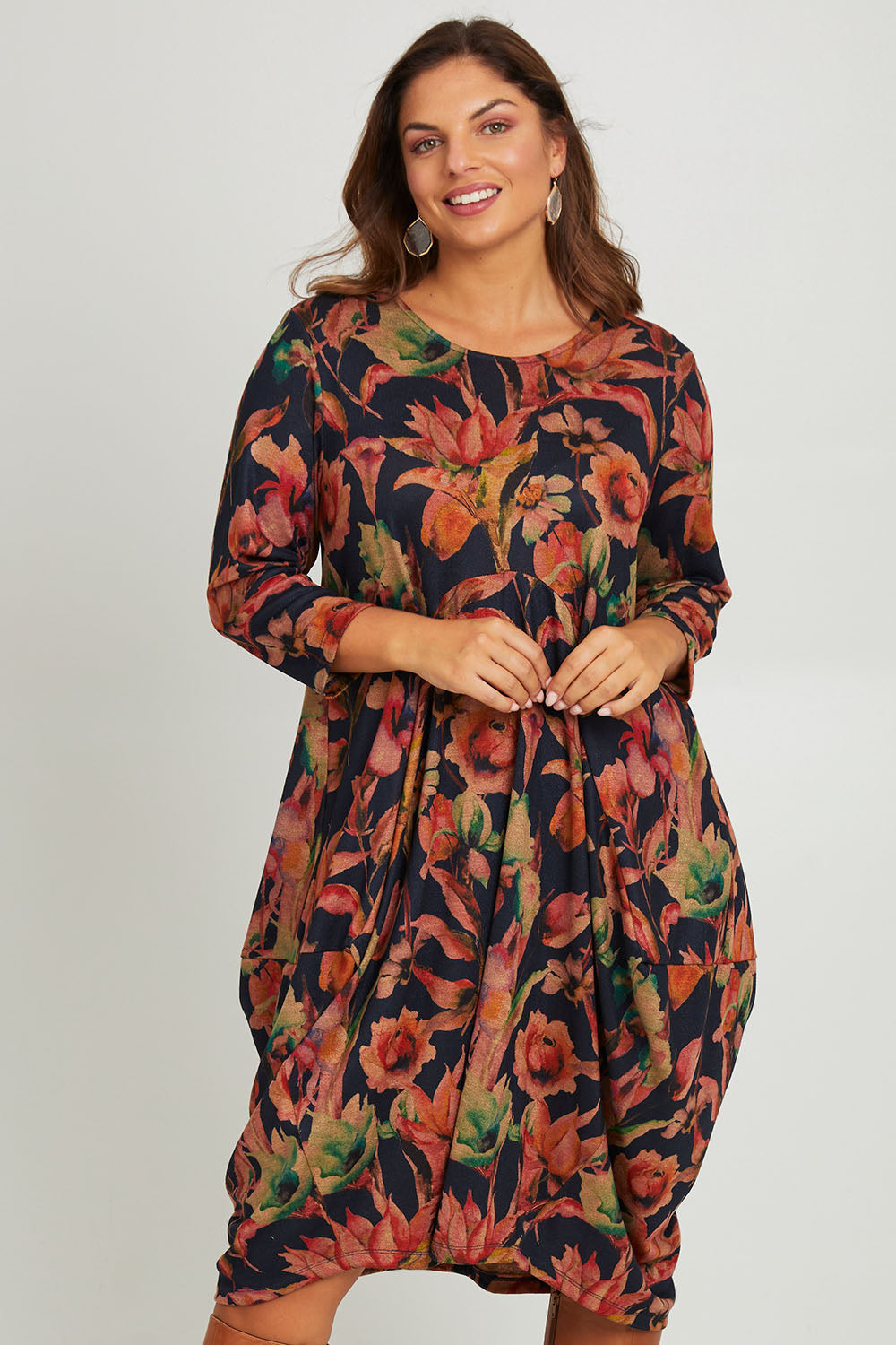 Model Monique wearing size 14 of the Bounce Dress in colour Royal (Blue), from the front, cropped image