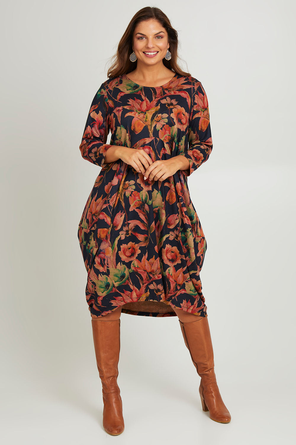 Model Monique wearing size 14 of the Bounce Dress in colour Royal (Blue), from the front, showing the whole outfit