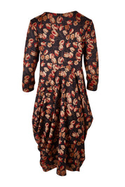 Product shot of the Bounce Dress in colour Rust (Black), from the back