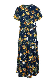 Product shot of the Printed Tier Dress in colour Navylemon (Blue), from the back