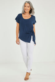 Model Luisa wearing size 10 of the Bora Bora Top in colour Navy (Blue), from the front, showing the whole outfit