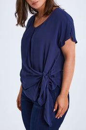 Model Monique wearing size 14 of the Bora Bora Top in colour Navy (Blue), from the front, cropped image