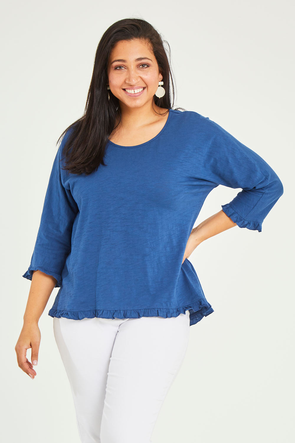 Model Terri-Leigh wearing size 14 of the Ruffle 3/4 Sleeve Top in colour Navy (White), from the front, cropped image
