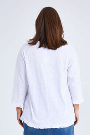 Model Monique wearing size 14 of the Ruffle 3/4 Sleeve Top in colour White (White), from the back