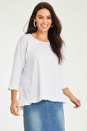 Model Stacey wearing size 10 of the Ruffle 3/4 Sleeve Top in colour White (White), from the front, cropped image