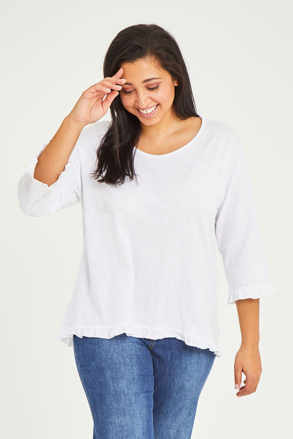 Model Terri-Leigh wearing size 14 of the Ruffle 3/4 Sleeve Top in colour White (White), from the front, cropped image